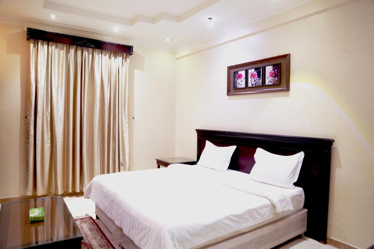 By Quiet Rooms ركن العمر للوحدات السكنية